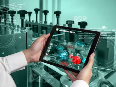 Engineer use augmented reality software in smart factory production line